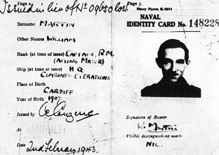 Major Martin's naval identity card with photograph of Captain Ronnie Reed.