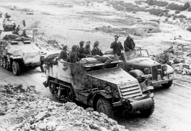 German soldiers in armored cars during the battle of Kasserine Pass